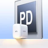 UGREEN power adapter with a PD sign in the background